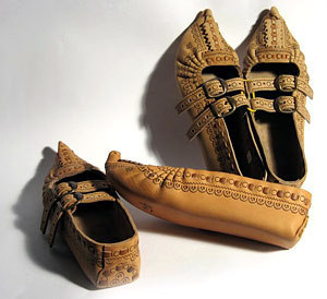 Hutsul leather postoly (shoes): poker-work, weaving, zhmurka.